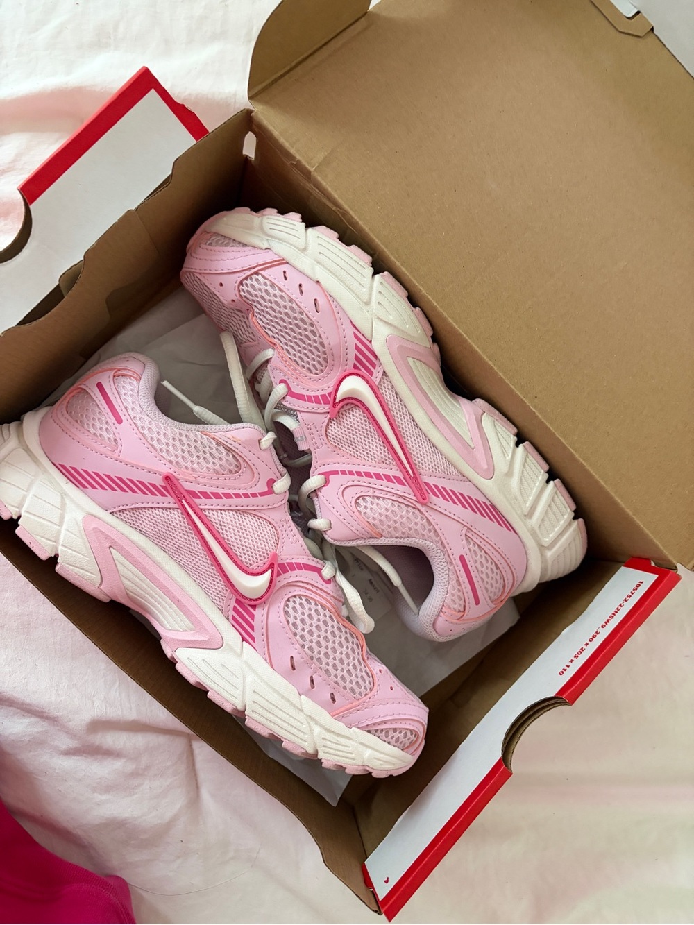 Nike Women’s Pink Mesh and White Athletic Sneakers